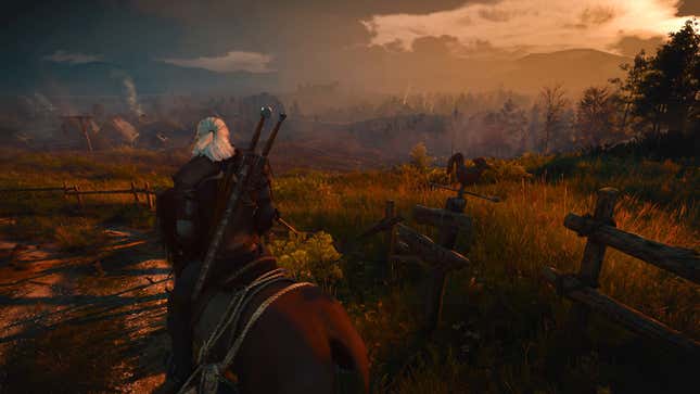Geralt takes in a sunset while riding on Roach.