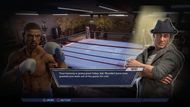 Creed and Rocky stand and talk inside of gym.